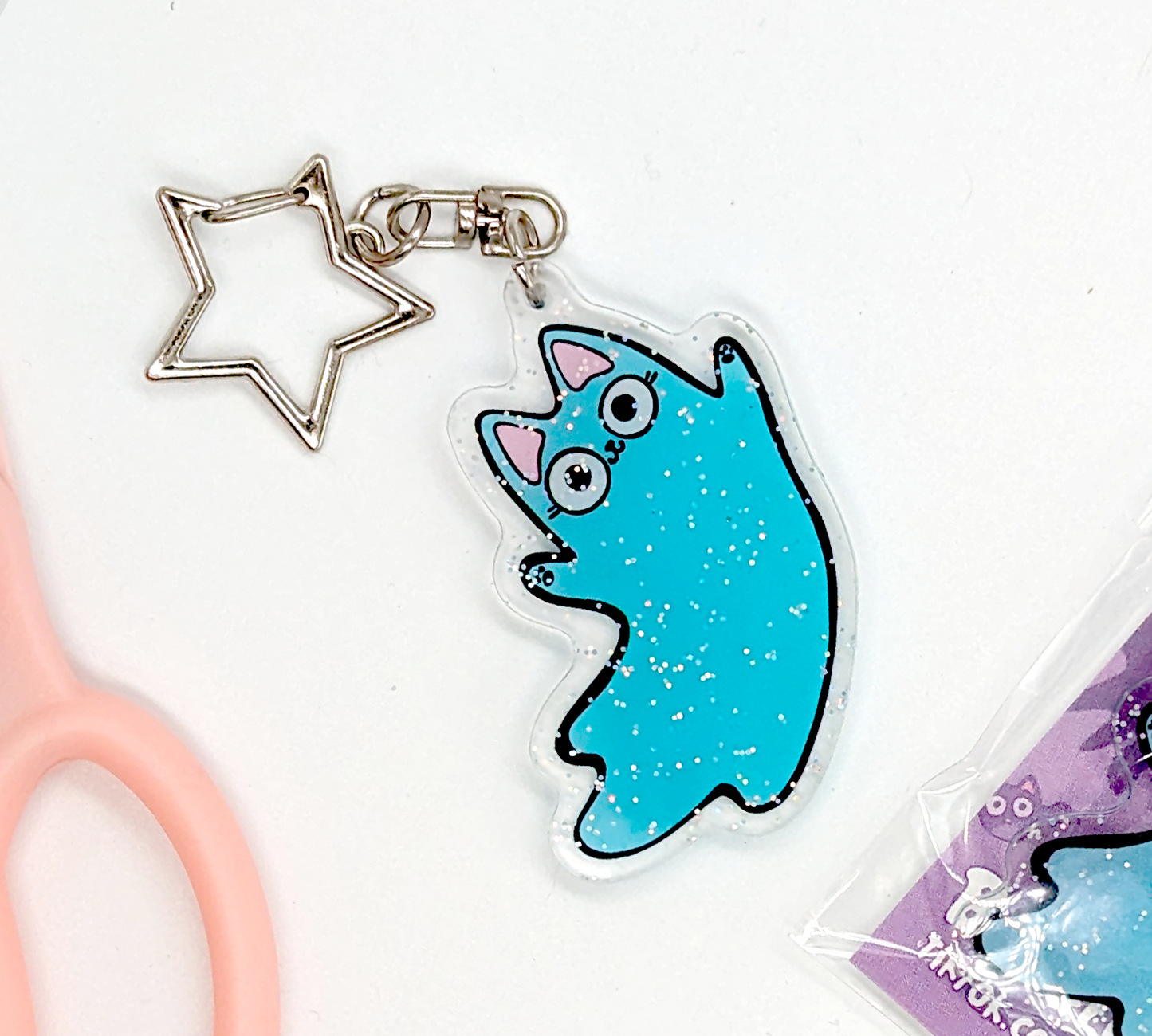 Ghost cat keychain with glitter and star attachment