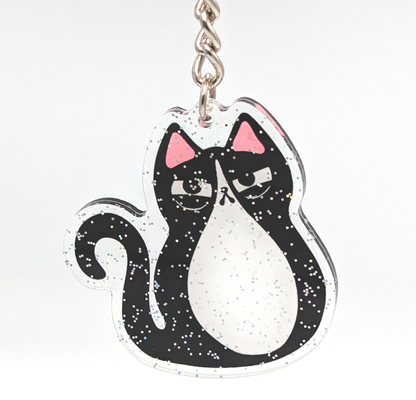 Funny tuxedo cat keychain that makes a funny gift for tuxedo cat lovers!