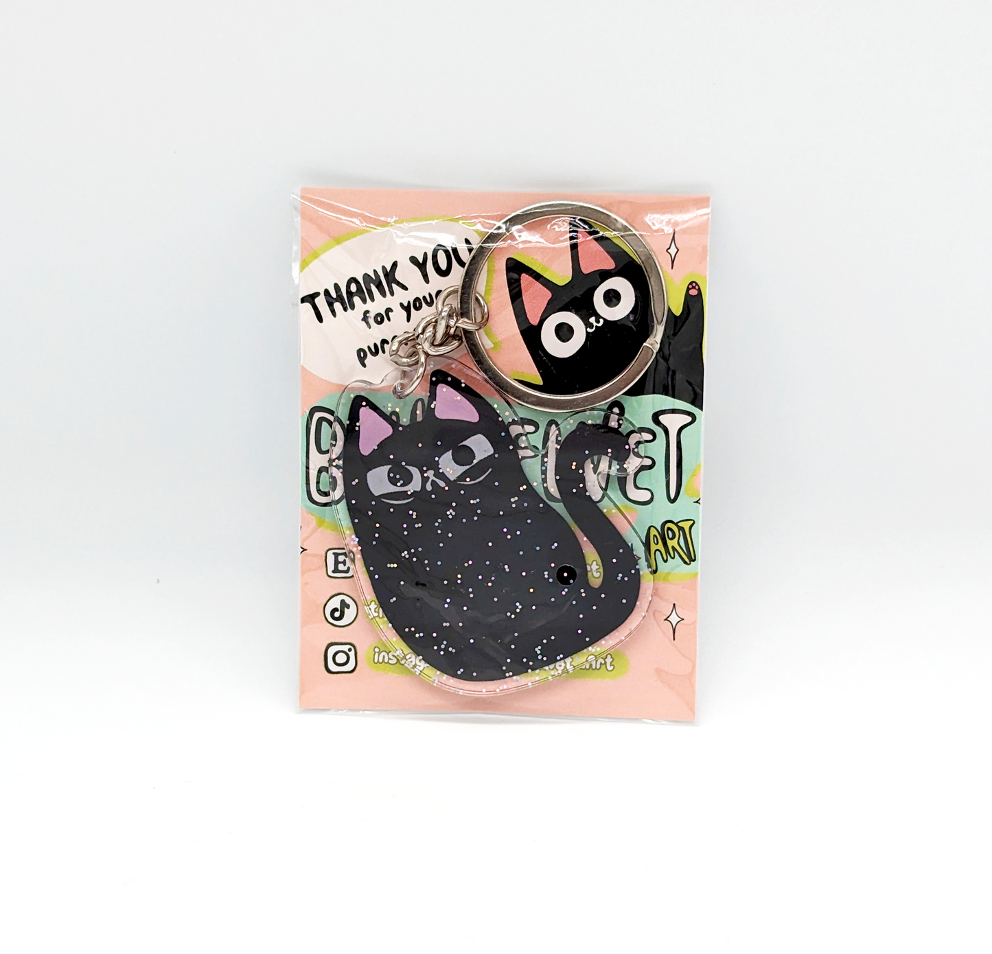 Acrylic glitter cat keychain in cute packaging!