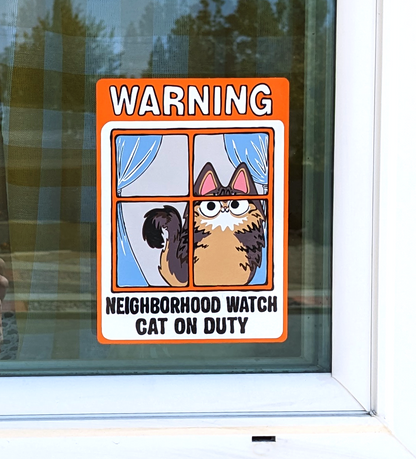 Fluffy Tabby Cat Neighborhood Watch Cat Window Cling that reads Warning Neighborhood watch cat on duty