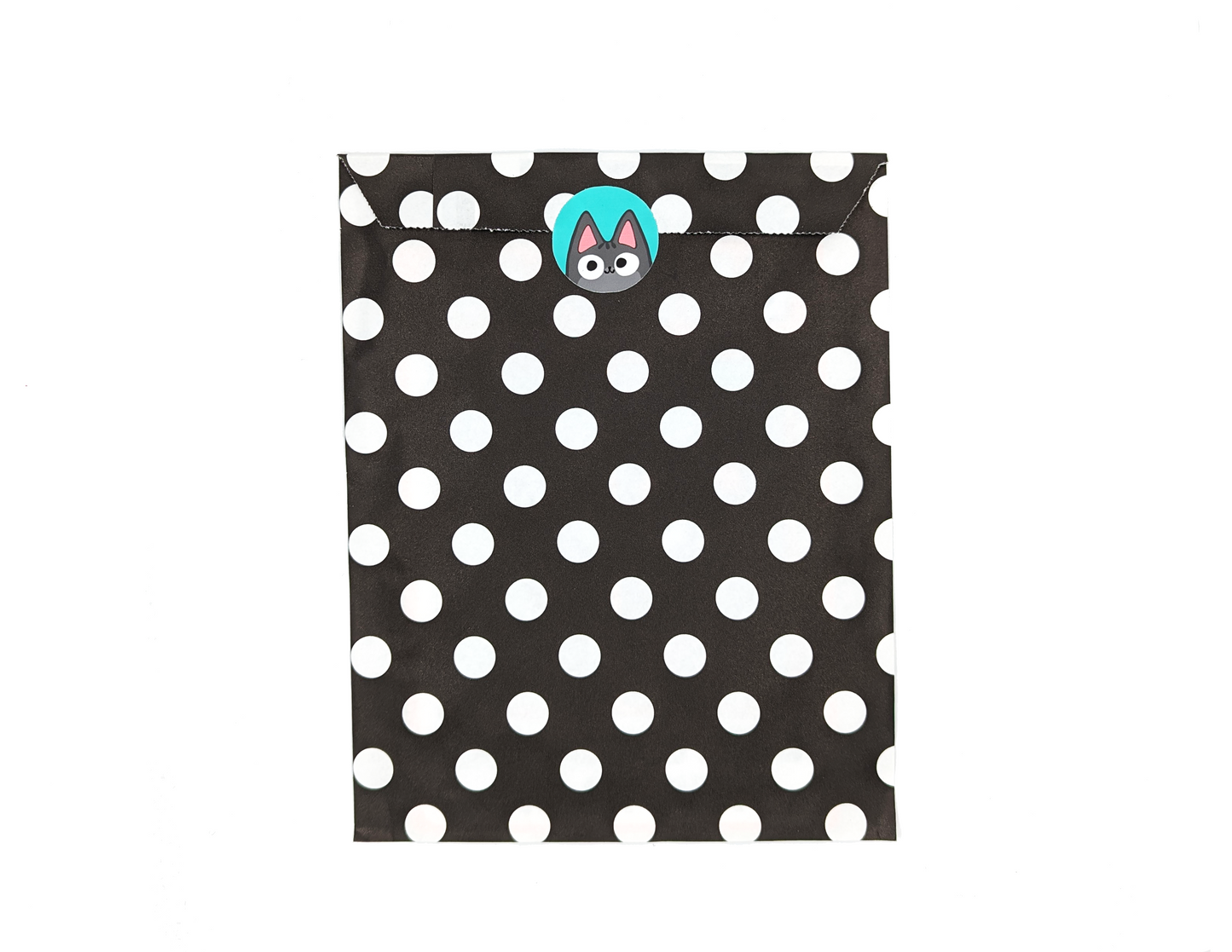 Cute black and white polka dot packaging for grey tabby cat