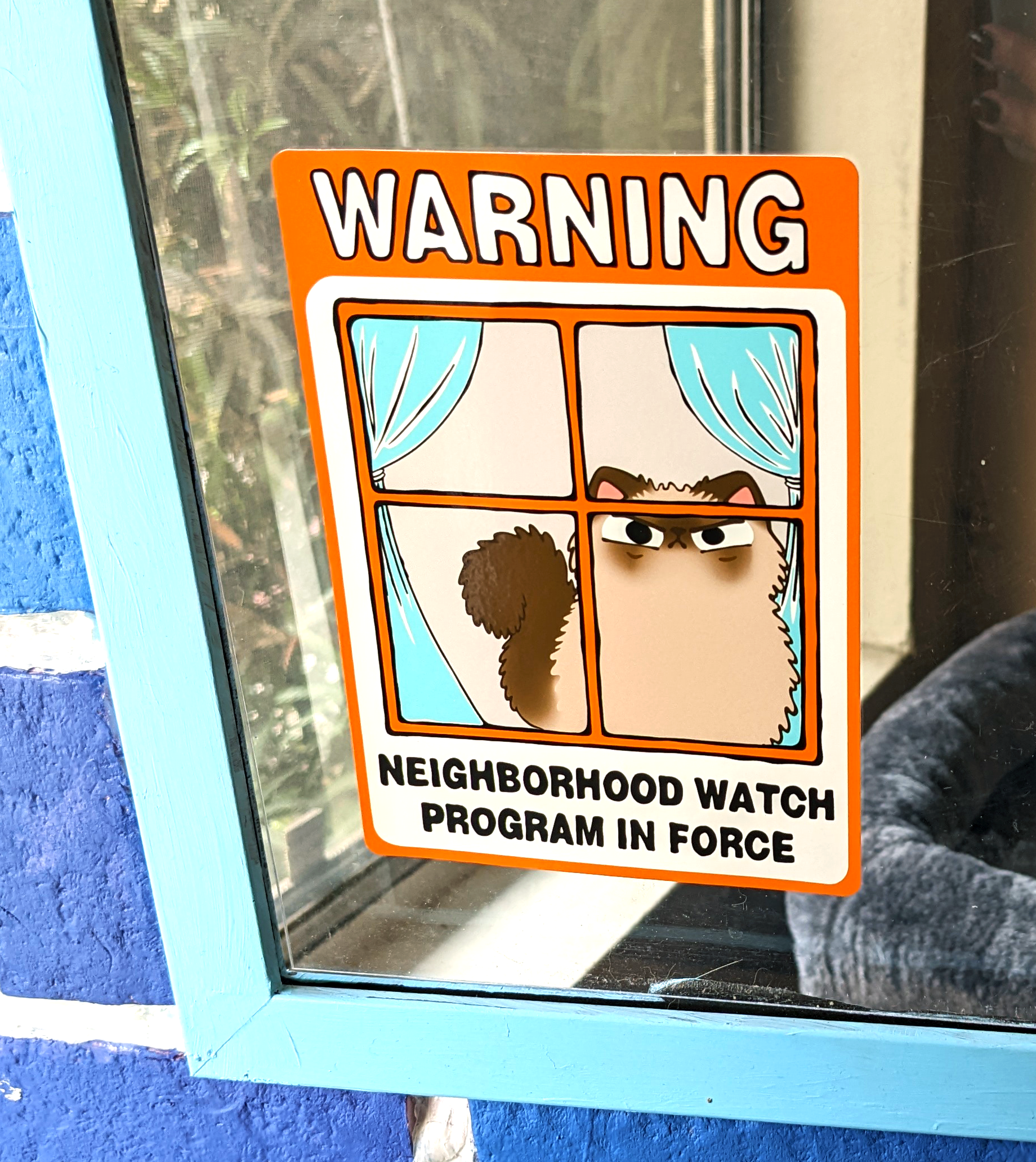 Neighborhood Watch Cat Window Cling of Himalayan Cat displayed on a house window