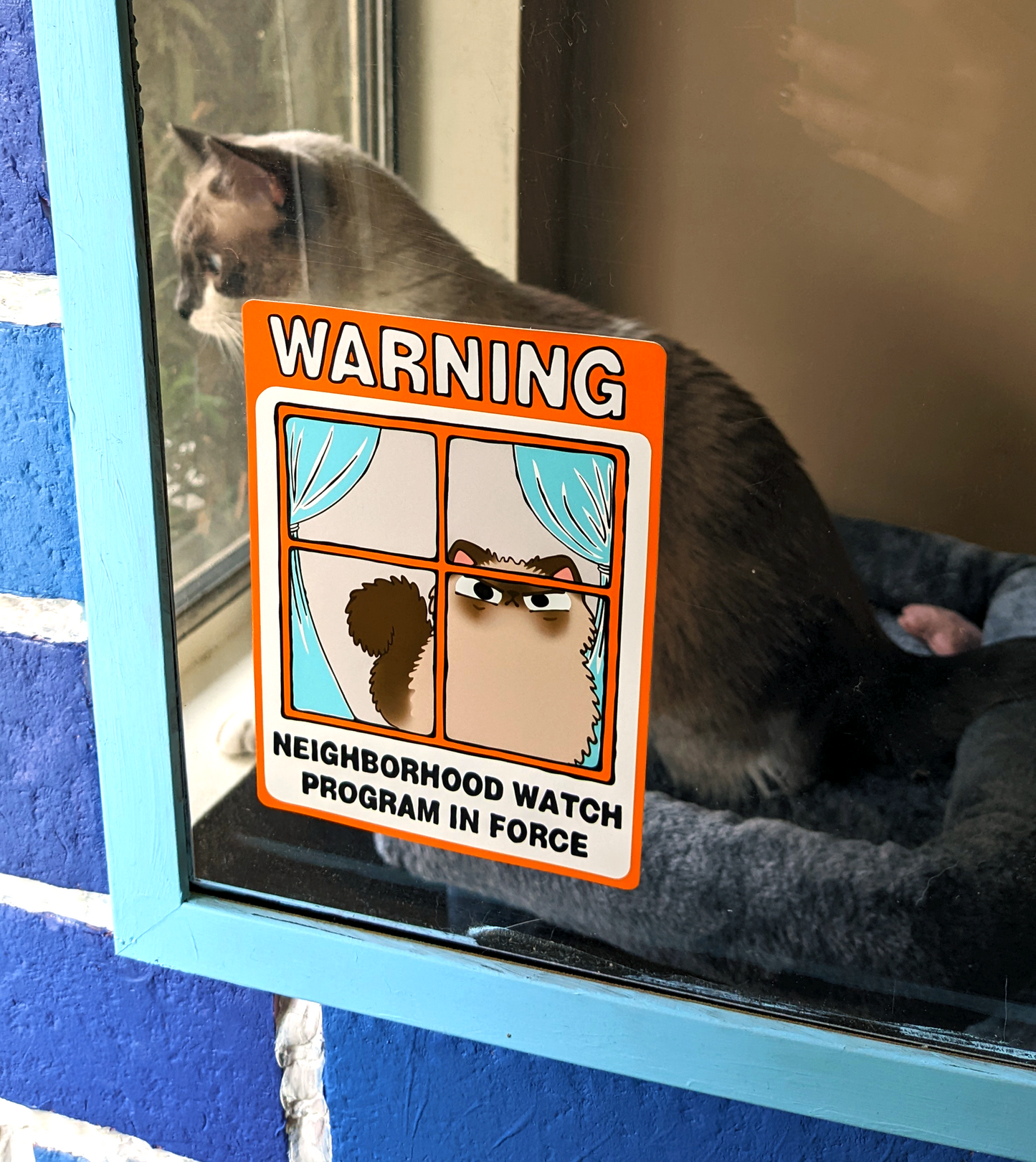 Himalayan Judgy Cat Art on a Neighborhood Watch Cat Window Cling