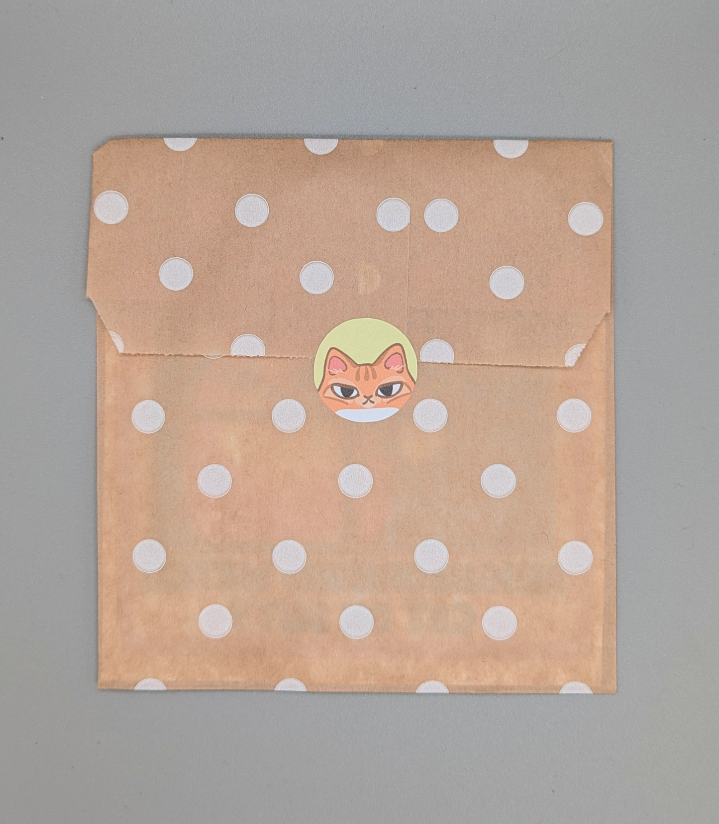 extra fluffy orange cat window cling packaging