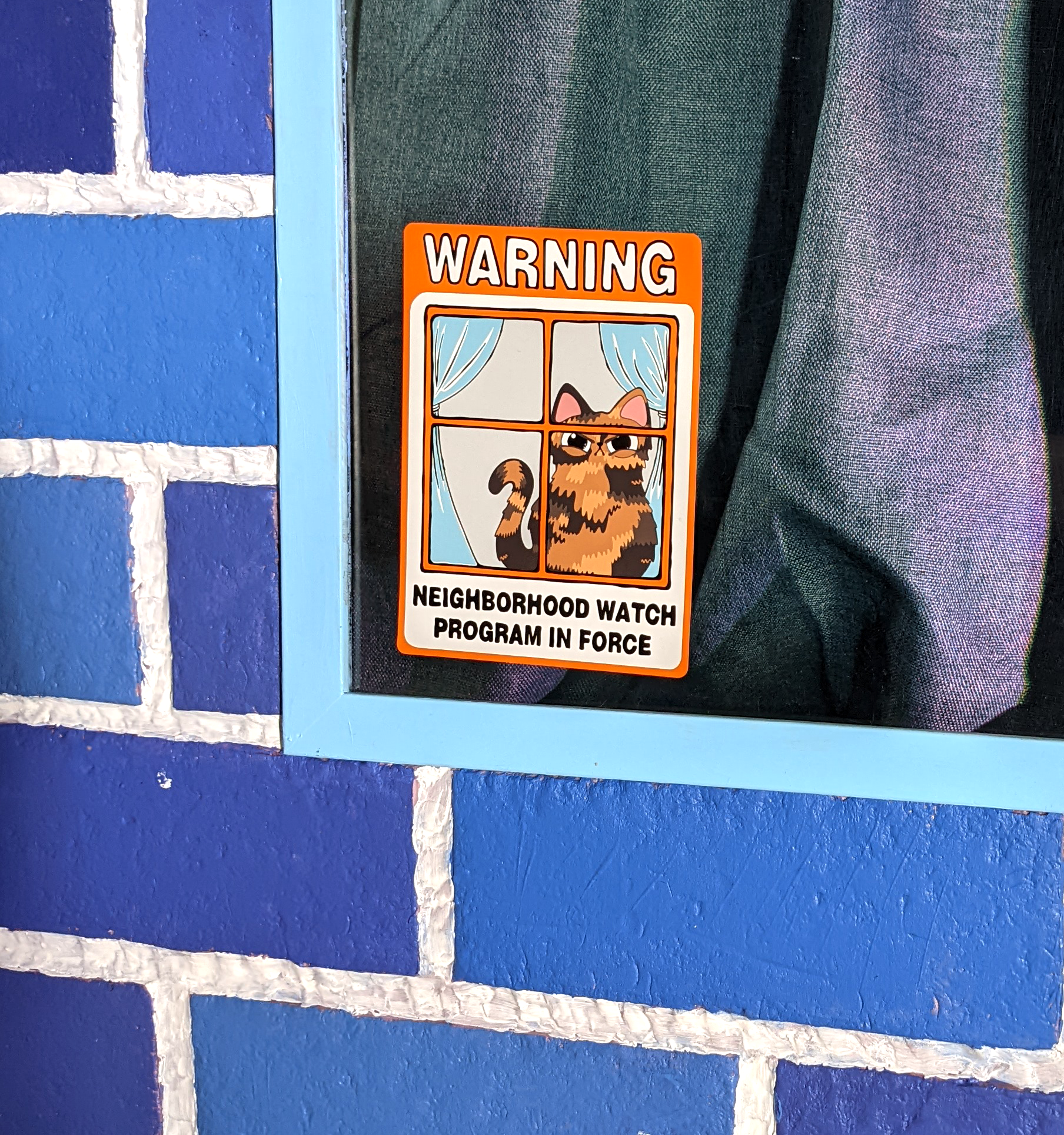 funny indoor cat pun on a window cling featuring a cute angry tortie cat