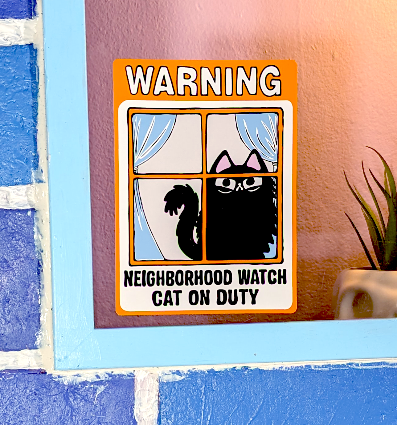 Neighborhood watch cat on duty window cling features a judgy fluffy black cat that watches from a window