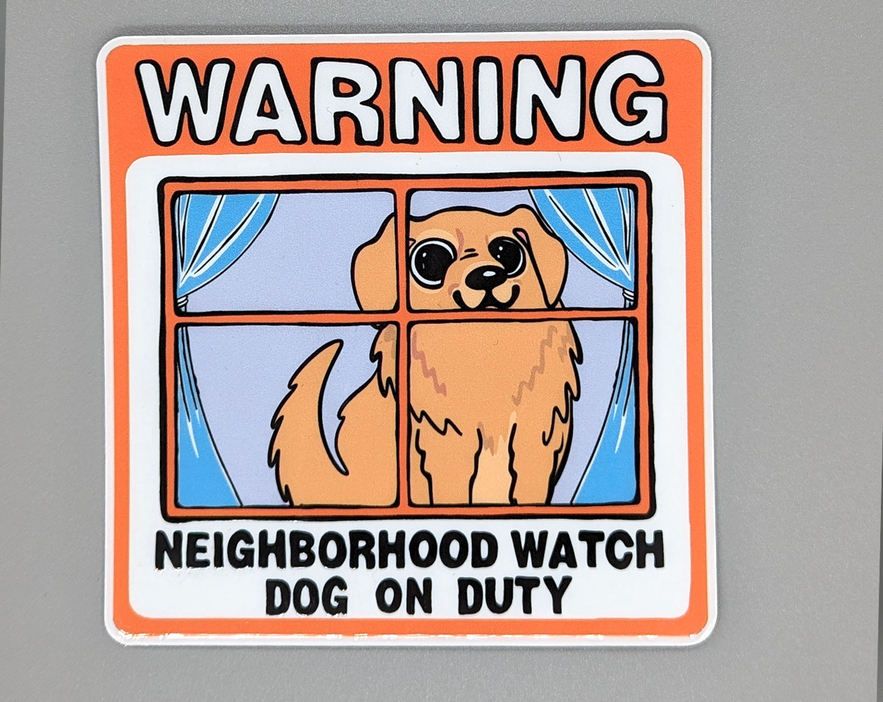 Golden retriever window cling that reads neighborhood watch dog on duty