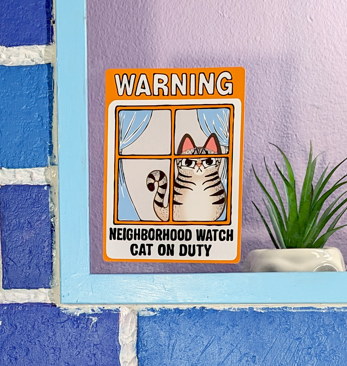 close up of Neighborhood Watch Cat Window Cling of judgy Tabby Cat 