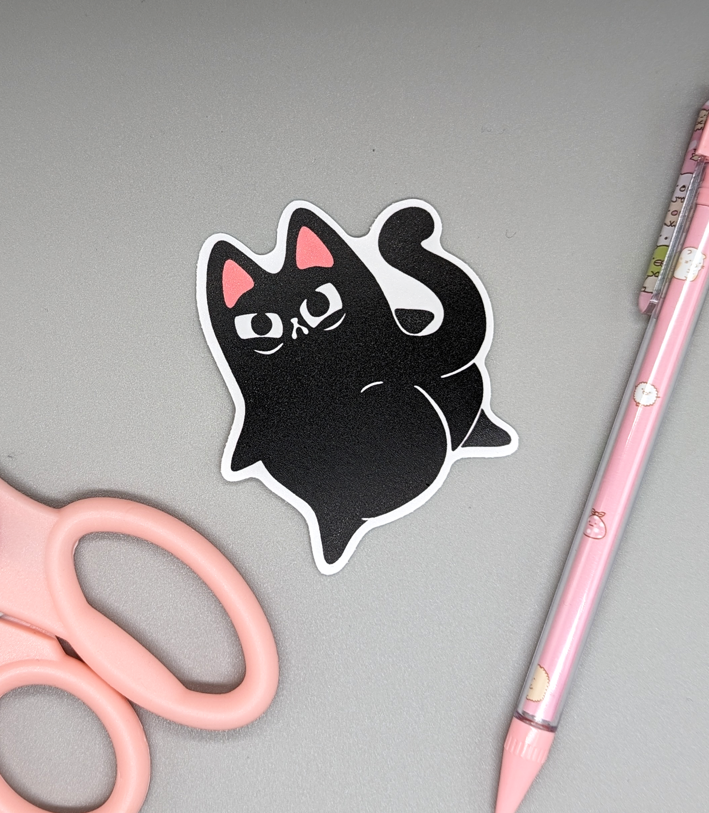 Judgy Cat is striking a pose while shaking their booty!  Waterproof and scratchproof vinyl diecut sticker! Very durable!  Sticker measures 2.5 × 2.3 inches!